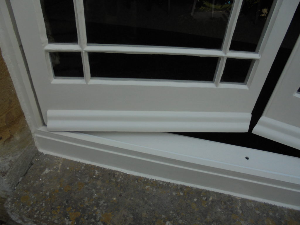 Timber Window Conservation - casement doors repaired and repainted