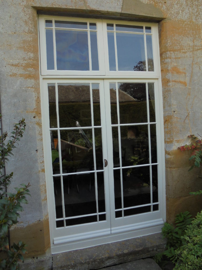 Timber Window Conservation - wood framed garden doors beautifully restored