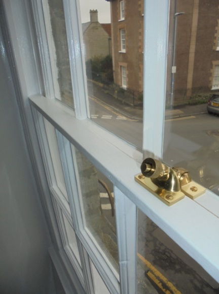 Timber Window Conservation - wood framed sash window repaired and repainted