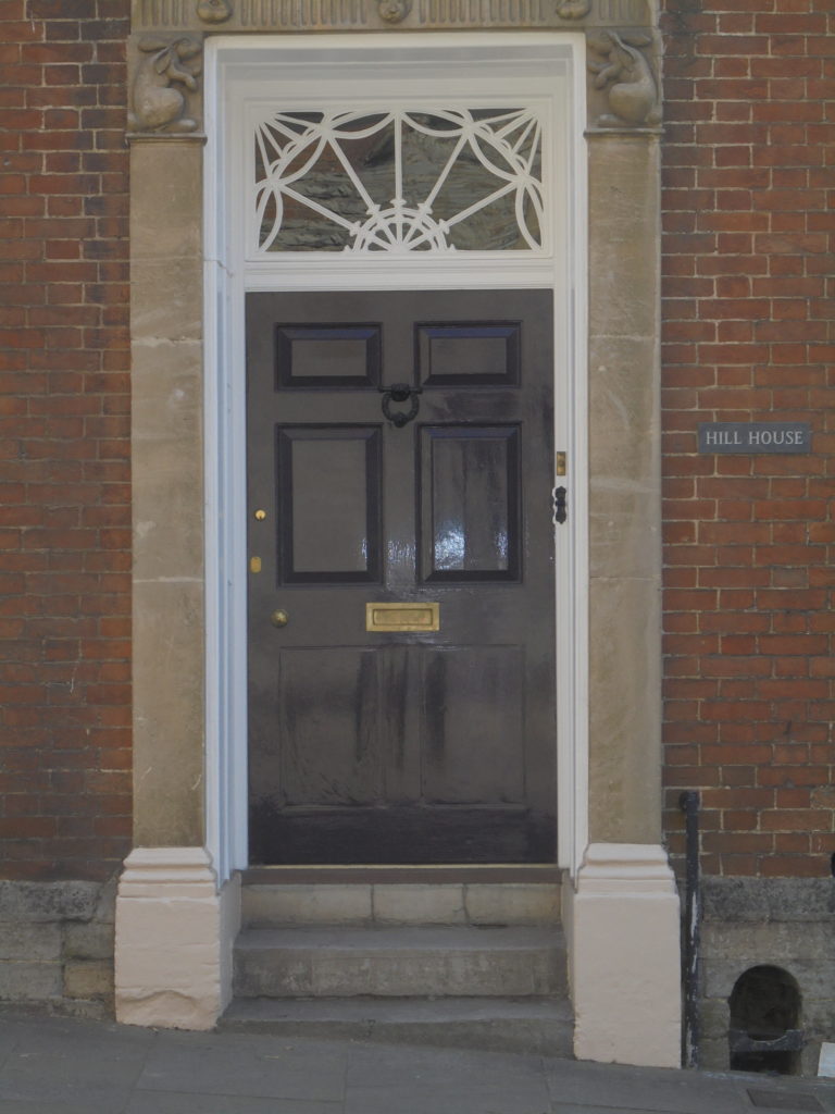 Timber Window Conservation - entrance door skillfully repainted