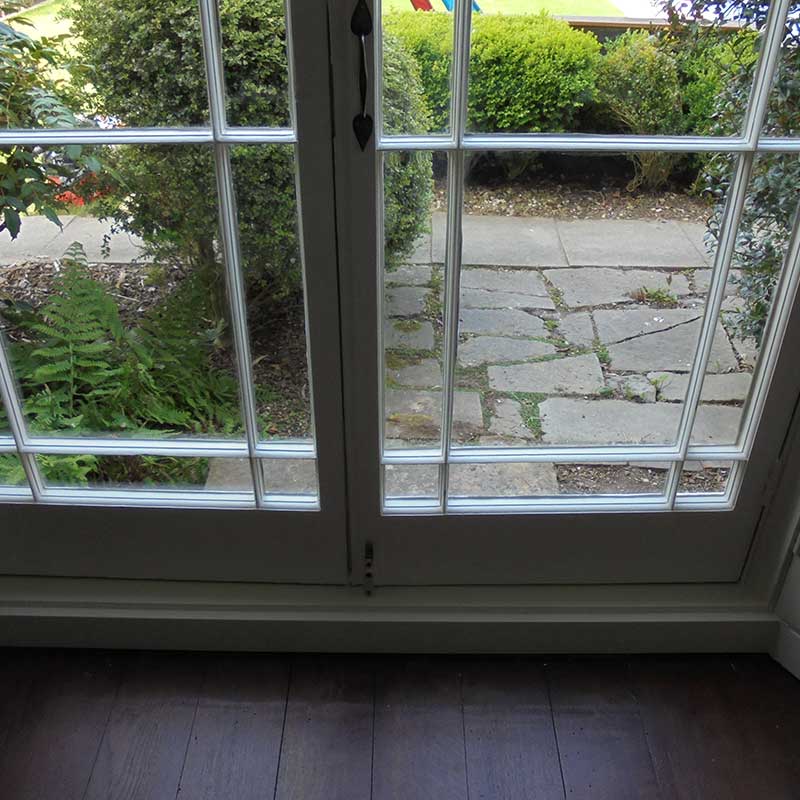 Timber Window Conservation - beautiful wood framed doors restored for a doctors surgery