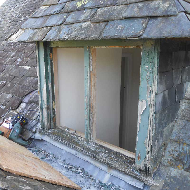 Timber Window Conservation - Wood frame window with glazing removed ready to start restoration